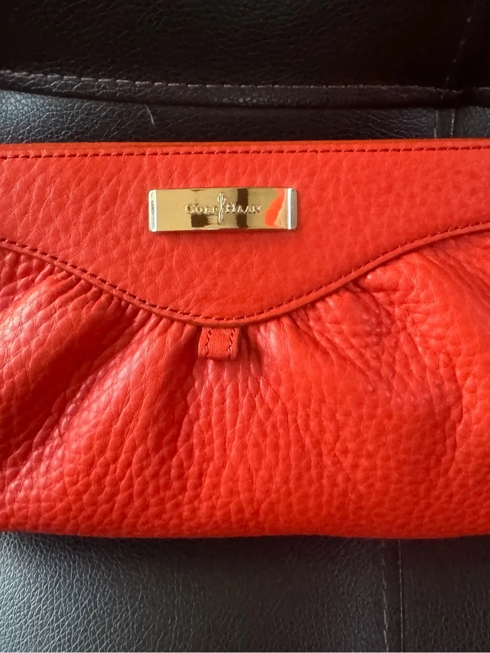 Cole Haan Orange Pebbled Leather Clutch with Gold Plaque